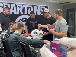 Michigan State University linemen receive pillows, mattresses, and sheets from TrueSleep.
