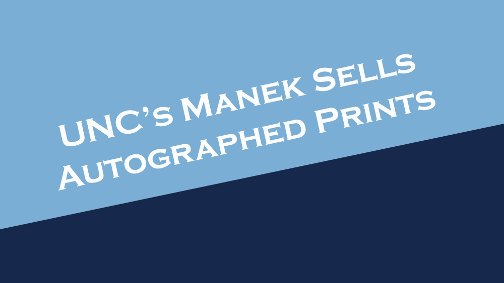 UNC's Manek sells autographed prints.