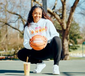 North Carolina Women's Basketball player Deja Kelly gets an NIL partnership with Dunkin' | Image courtesy of Dunkin'